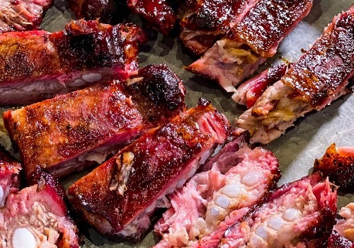 A closeup of delicious ribs, served by the best Barbecue Restaurant in East Peoria IL